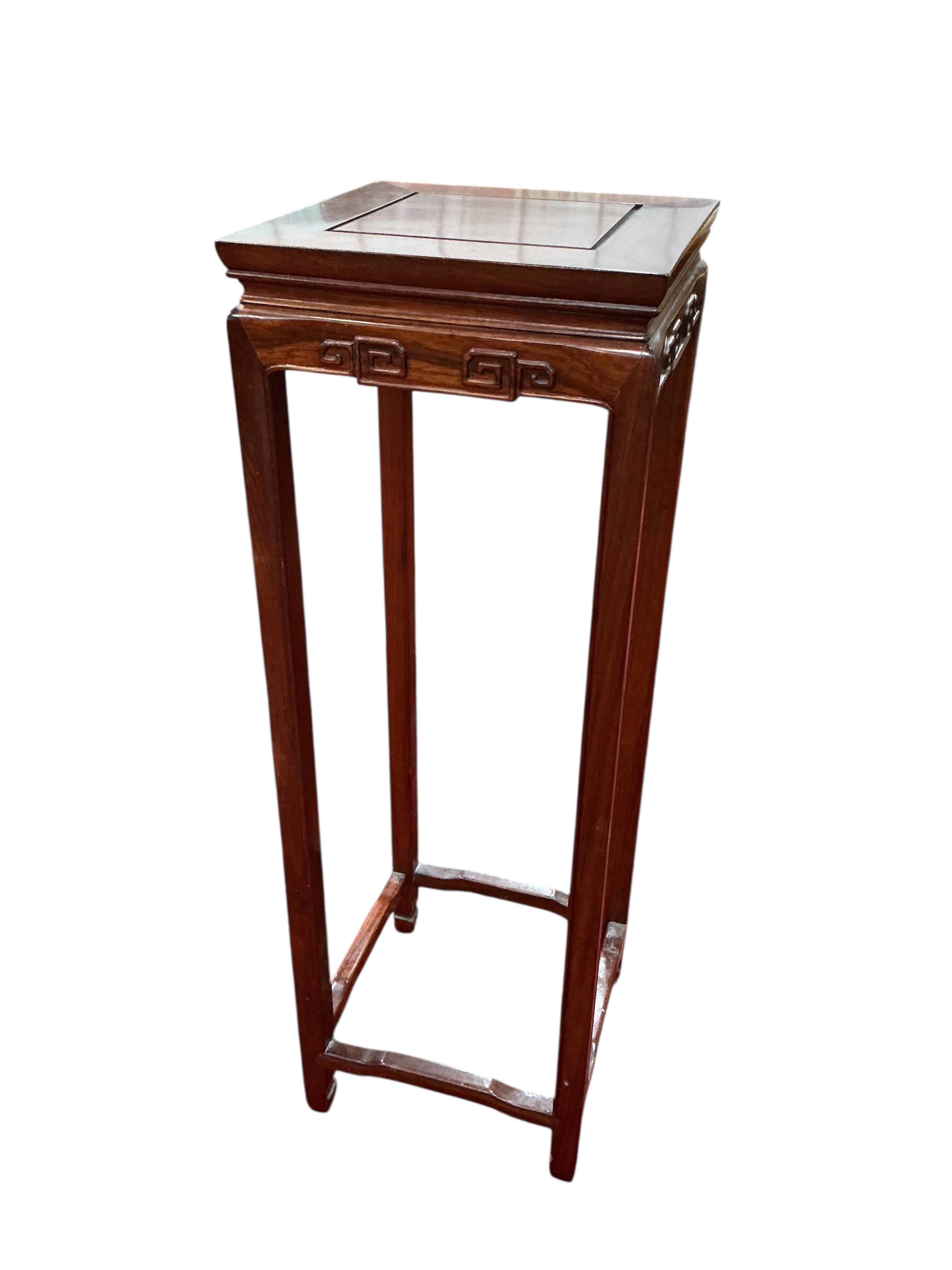 A Chinese hardwood vase stand, width 30cm, height 91cm